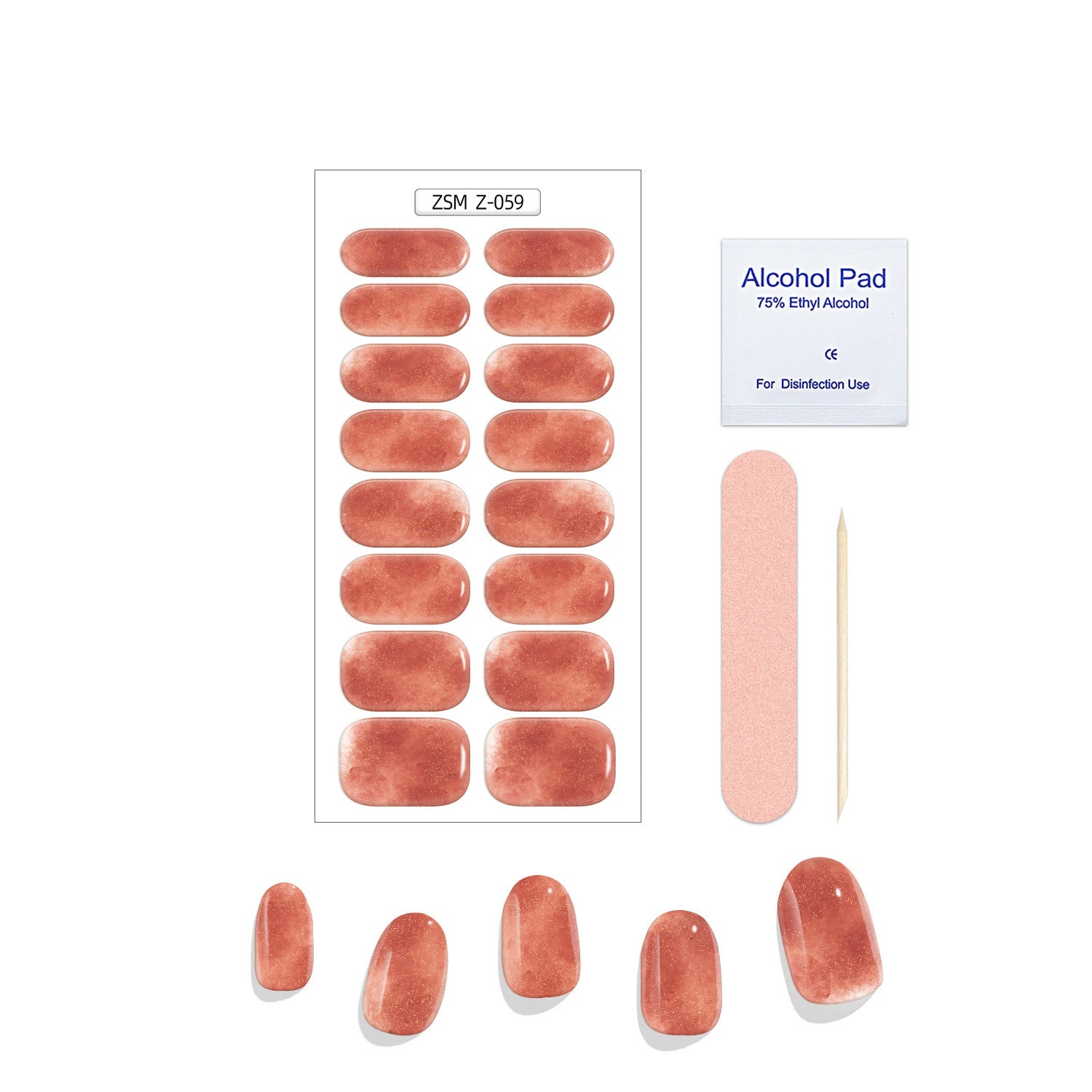 Crystal Chrome fashion set featuring rose-colored press-on nails, an alcohol pad, a nail file, and a wooden stick.