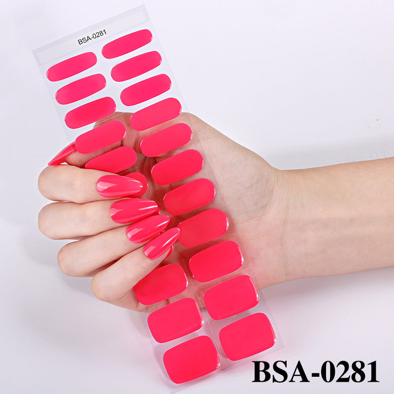 Pastel Non-UV nail strips in vibrant pink, displayed on a hand with long, pointed nails.