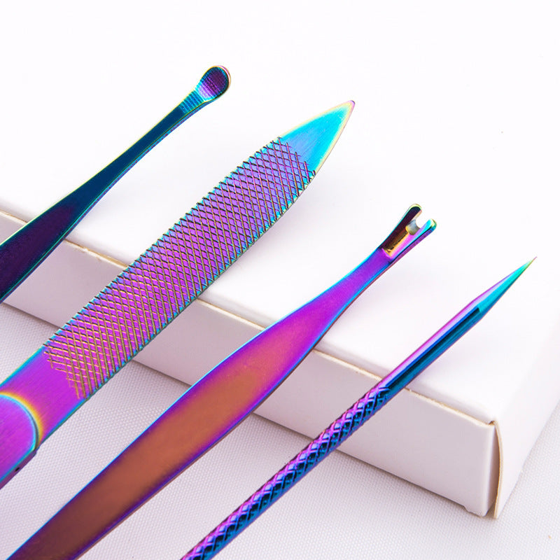 8-piece manicure set with rainbow-colored tools including scissors, tweezers, and a nail file on a white background.