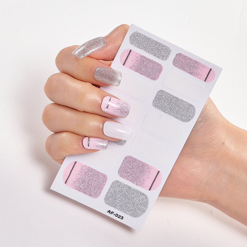 Every Shade of You nail wraps featuring pink, silver, and glitter designs on a hand holding the product sheet.