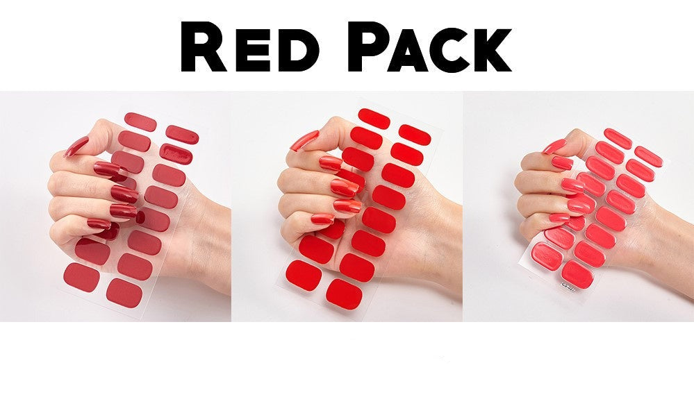 Triple bundle featuring three sets of red nail wraps displayed on a hand with manicured nails.