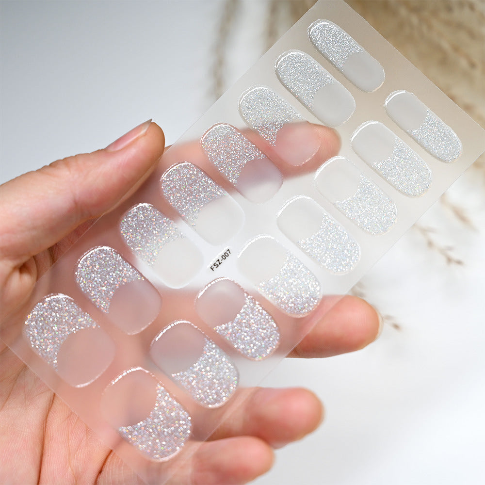 French glitter press-on nails in a clear package, featuring a shiny silver glitter finish.