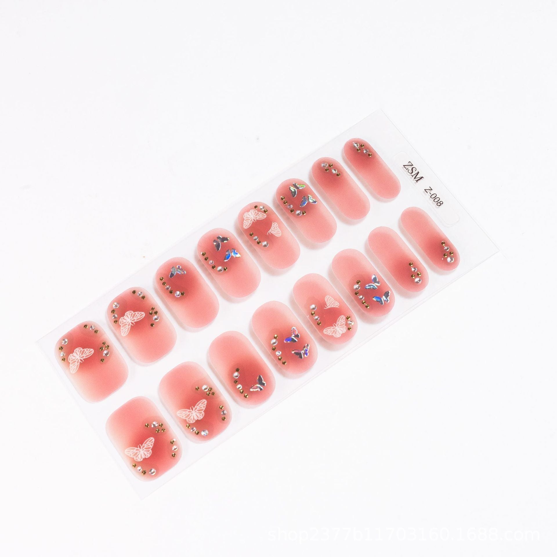 3D nail sticker sheet featuring pink base with butterfly and floral designs, embellished with small gems.