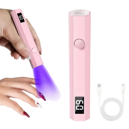 UV pen lamp in pink with a digital display, illuminating a hand with red nails, includes USB charging cable.