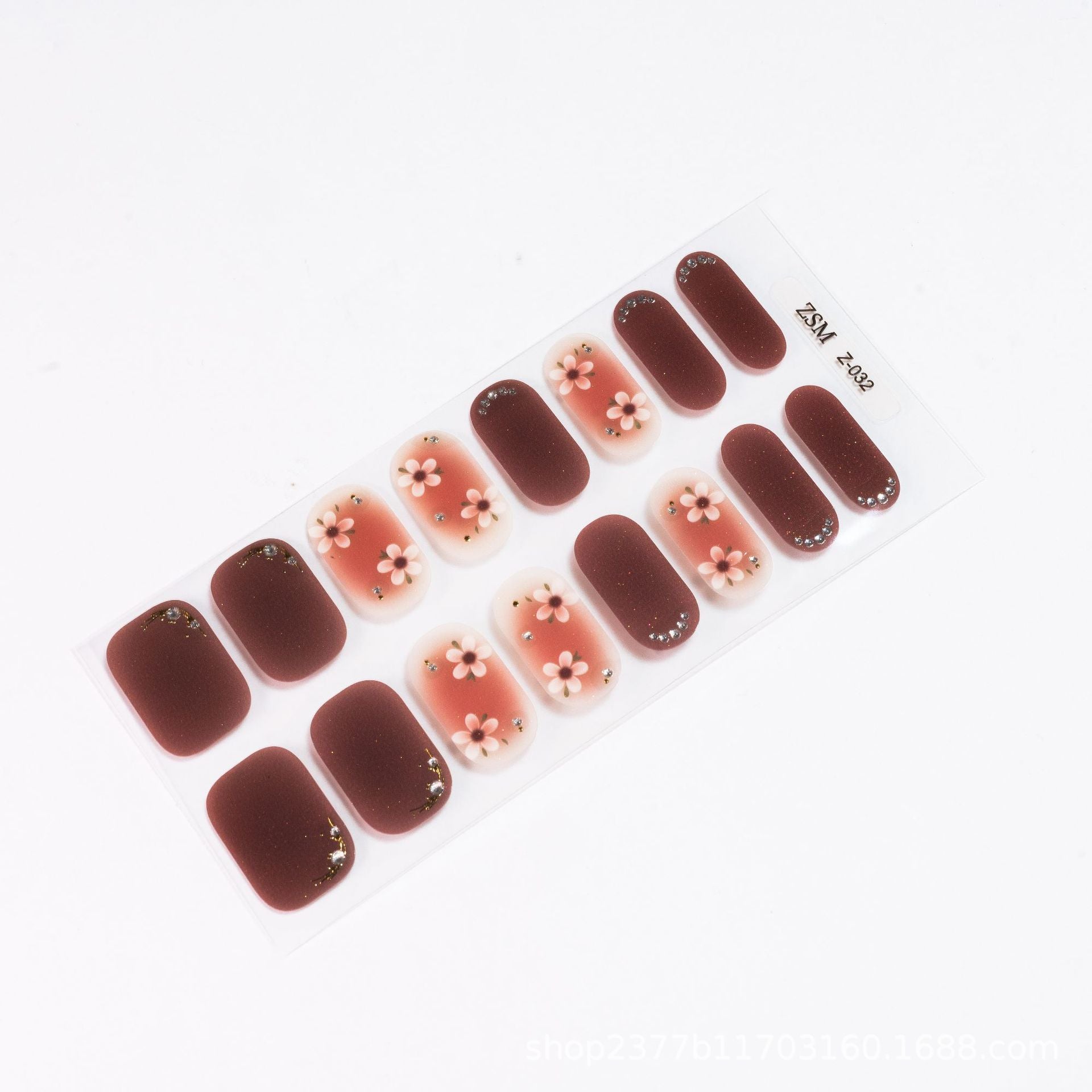 3D nail sticker sheet featuring various designs with floral accents in shades of pink and burgundy.