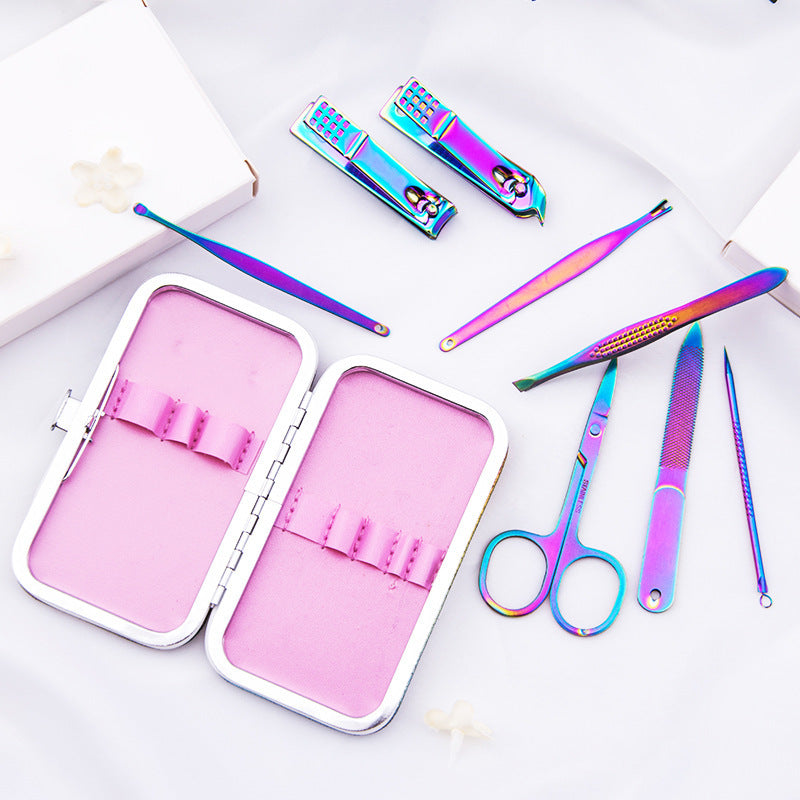 8-piece manicure set with rainbow-colored tools, including scissors, tweezers, and nail clippers in a pink case.
