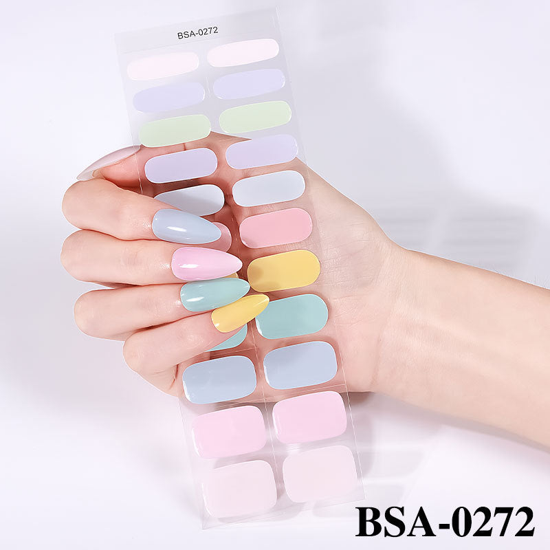 Pastel Non-UV nail stickers in various colors, including yellow, pink, blue, and purple, displayed on a hand.