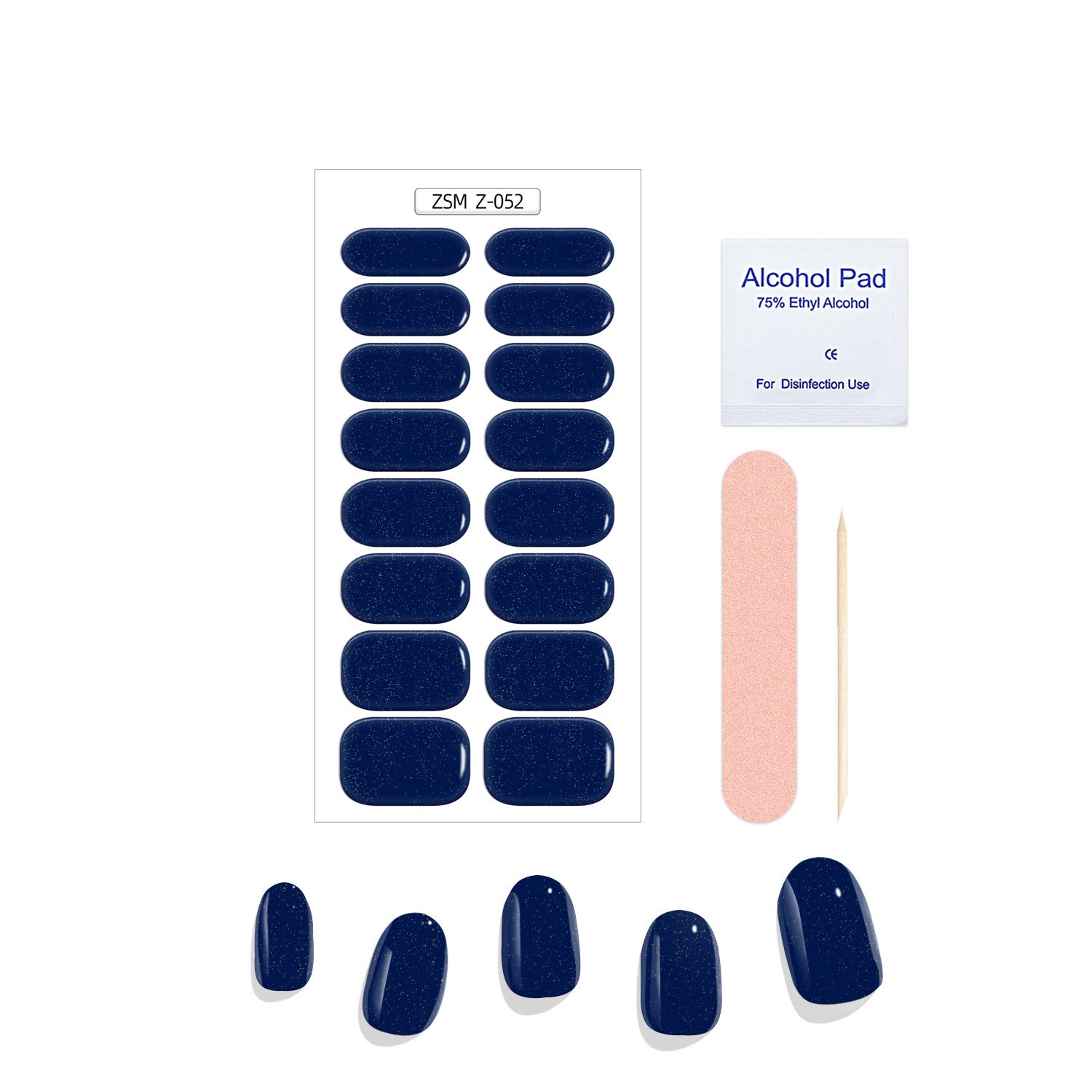 Crystal Chrome navy blue press-on nails with a glossy finish, accompanied by an alcohol pad and a nail file.