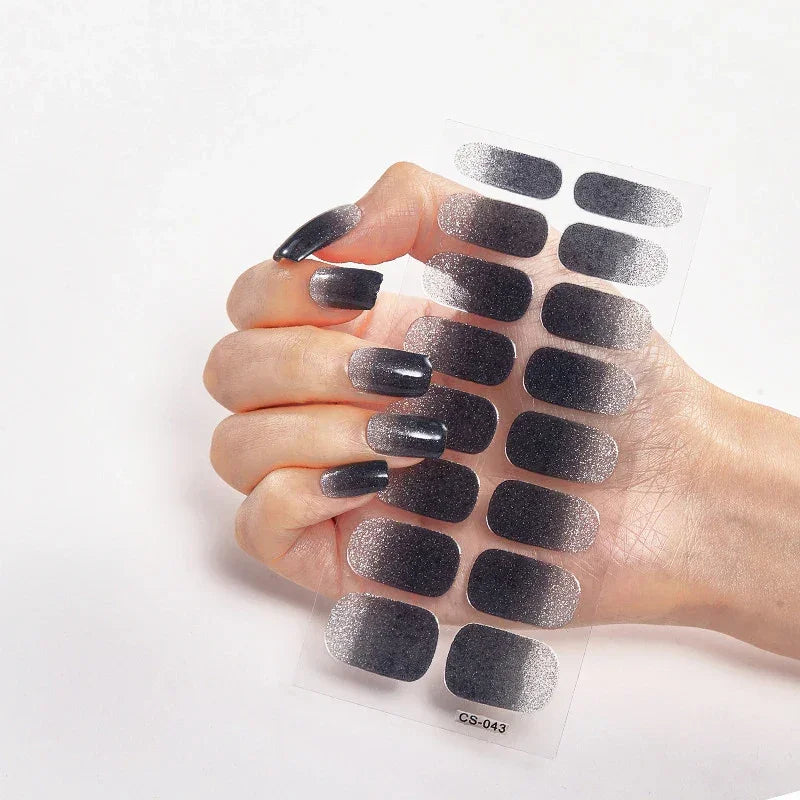 Currant™ Fade nail wraps displayed on a hand, featuring a gradient from dark to light gray.
