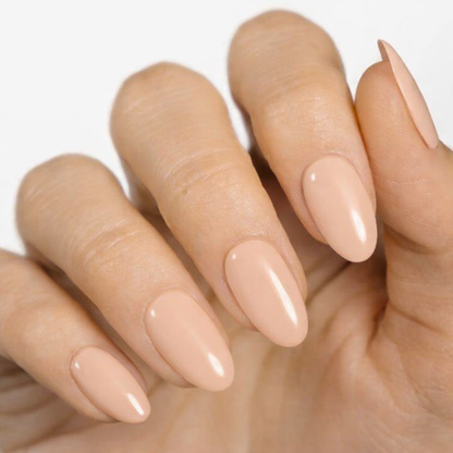 Currant™ nail wraps displayed on well-manicured hands with almond-shaped, nude-colored nails.