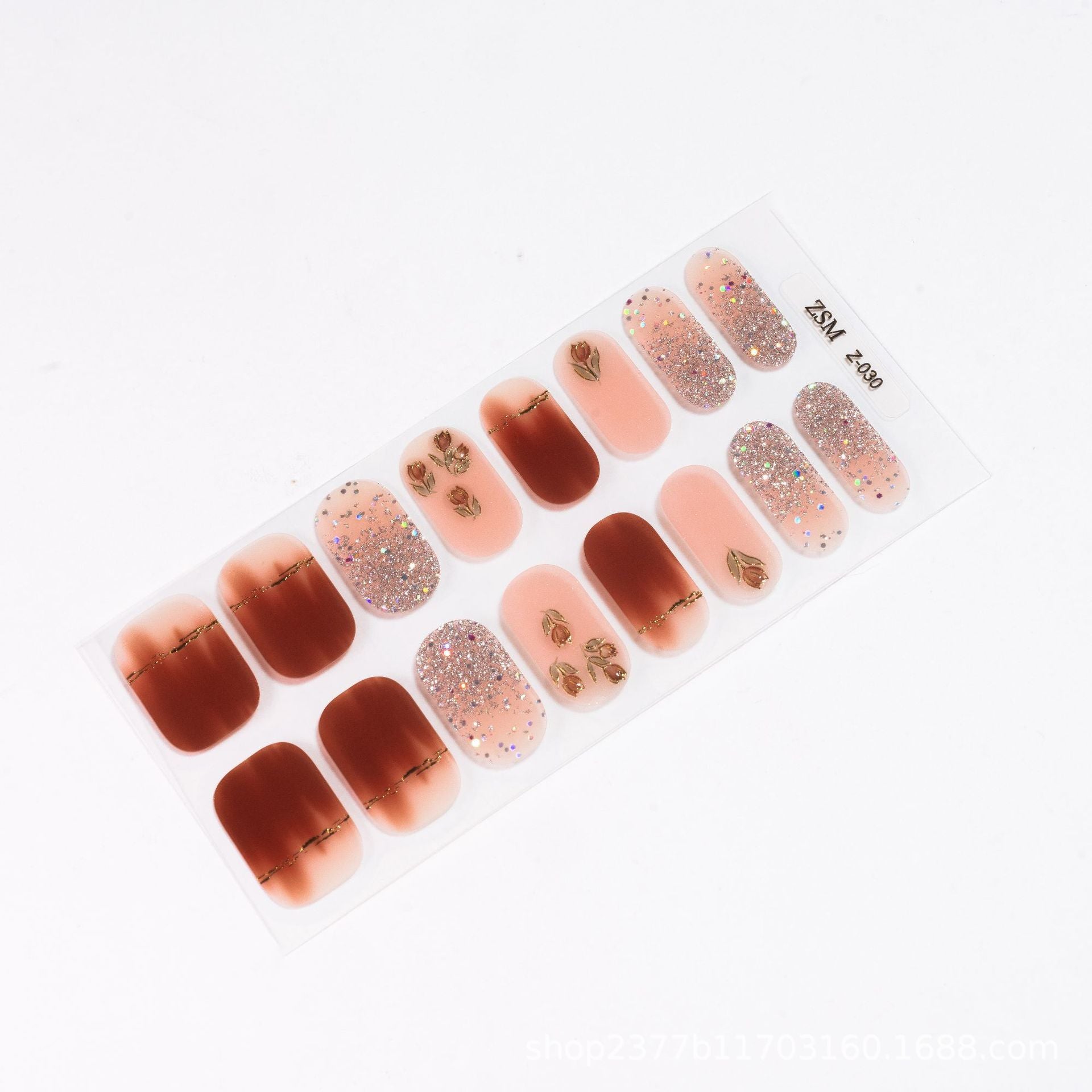3D nail sticker sheet featuring various designs in shades of pink, brown, and glitter accents.