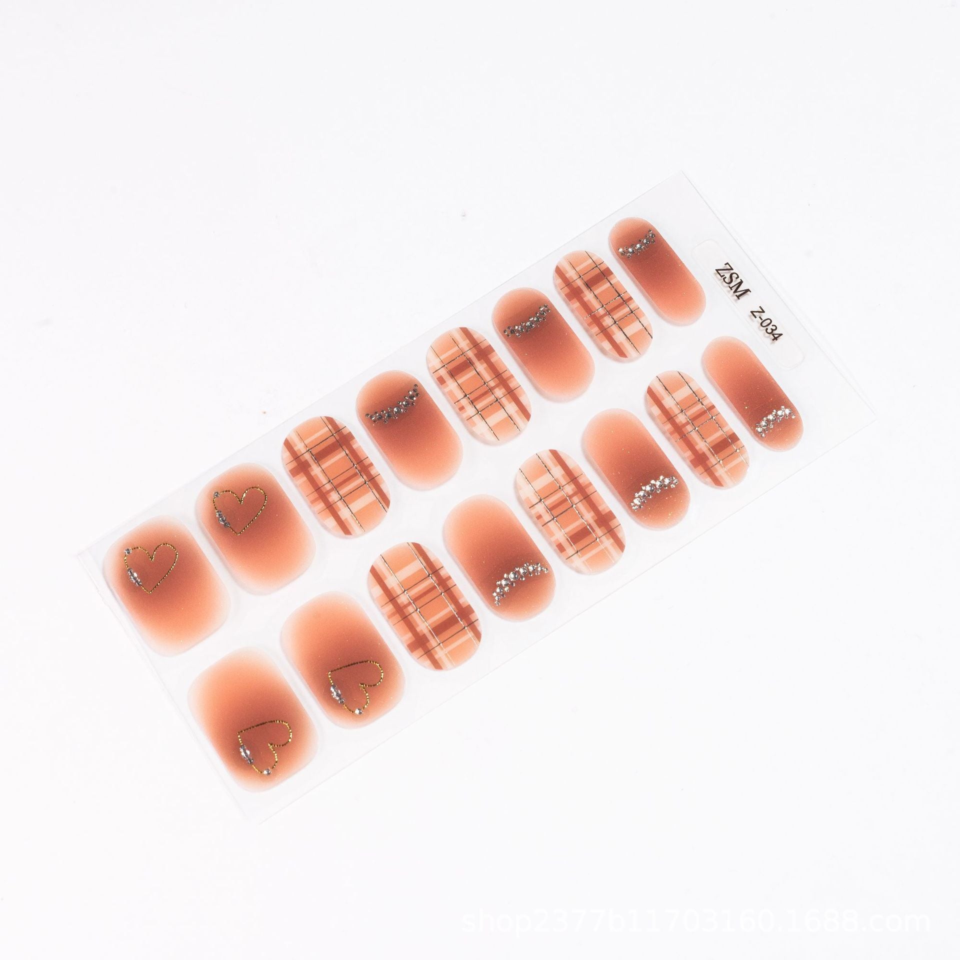 3D nail sticker sheet featuring various designs, including plaid patterns and heart shapes in soft peach tones.