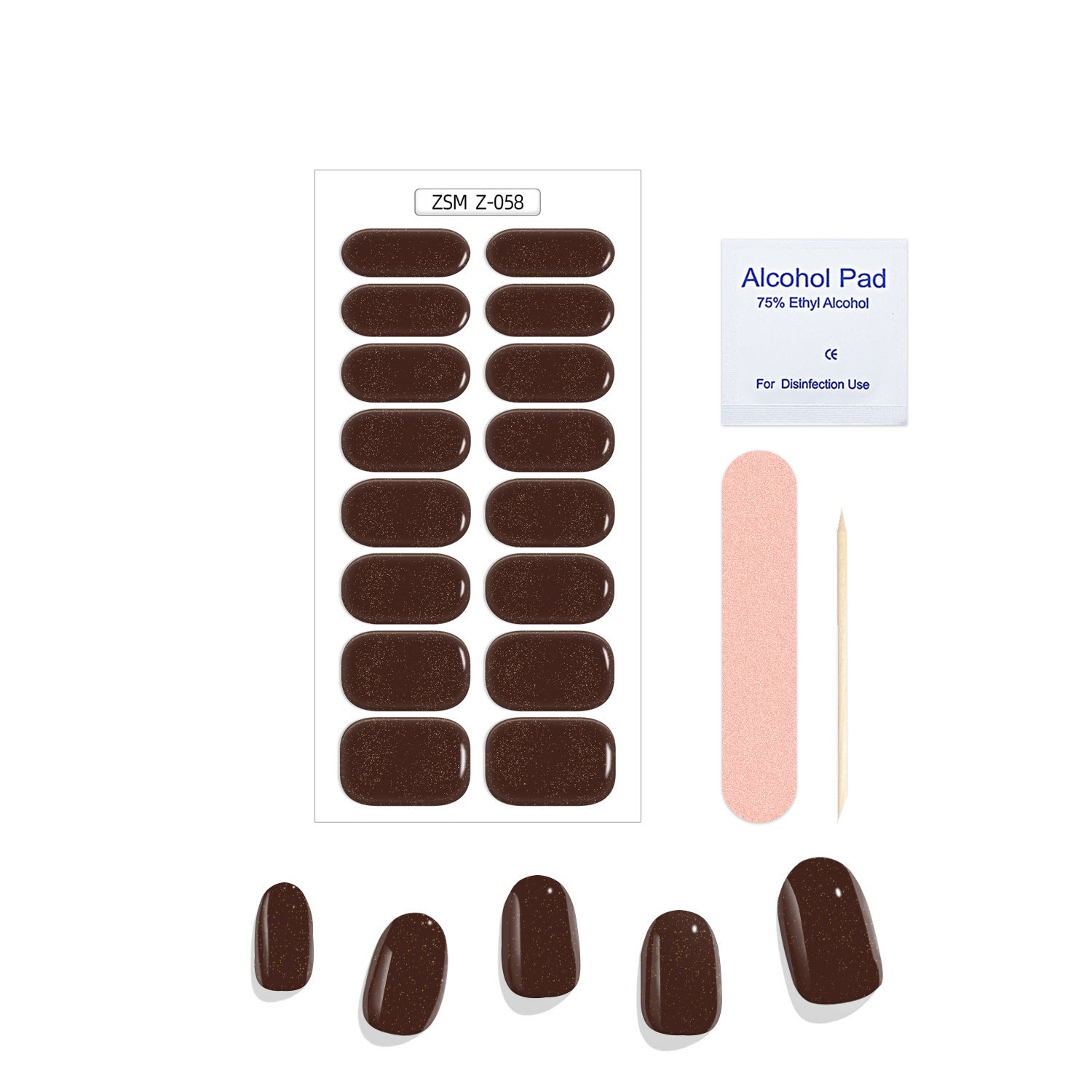 Crystal Chrome fashion nail set featuring dark brown adhesive nails, an alcohol pad, a nail file, and a wooden stick.