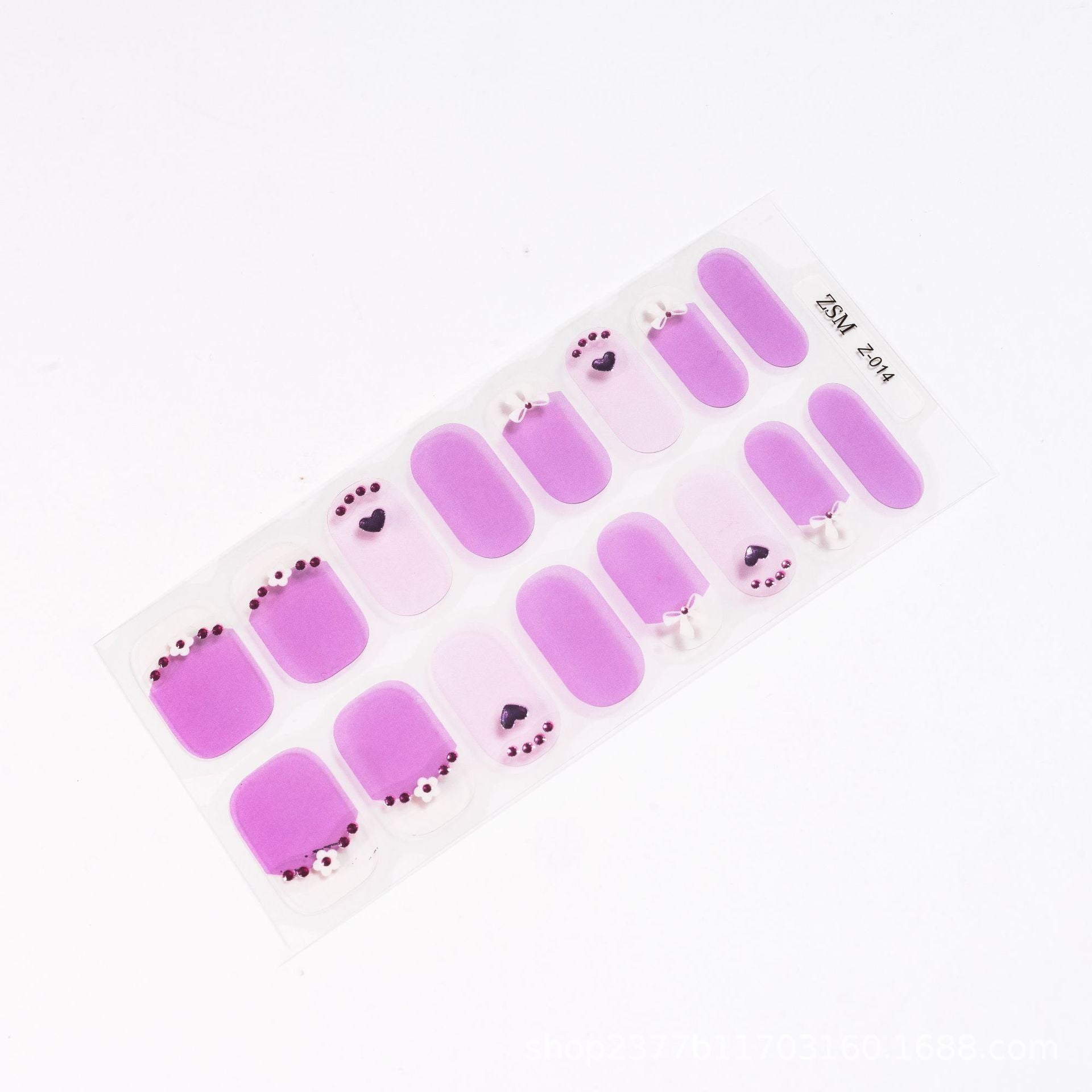 3D nail sticker sheet featuring various purple designs, including hearts and rounded shapes, on a clear backing.